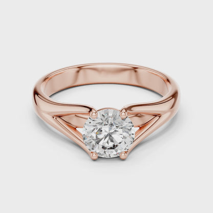 Round cut lab grown diamond solitaire engagement ring in rose gold with modern split cathedral setting