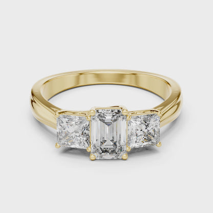 Three Stone Emerald Cut Diamond Ring with Princess Side Stones in 14K Yellow Gold